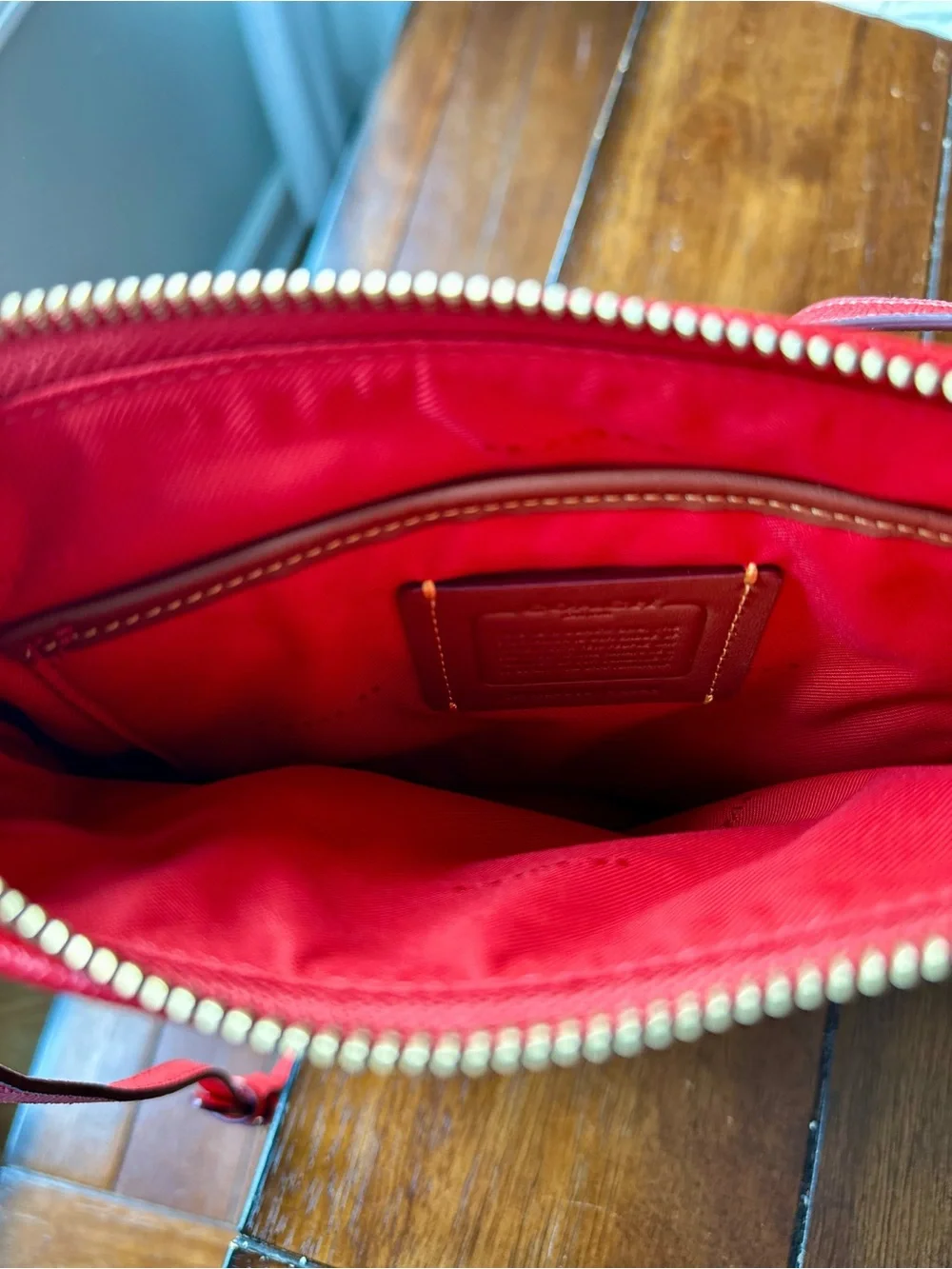 Coach Red Pebbled Leather Crossbody Purse with Gold Hardware